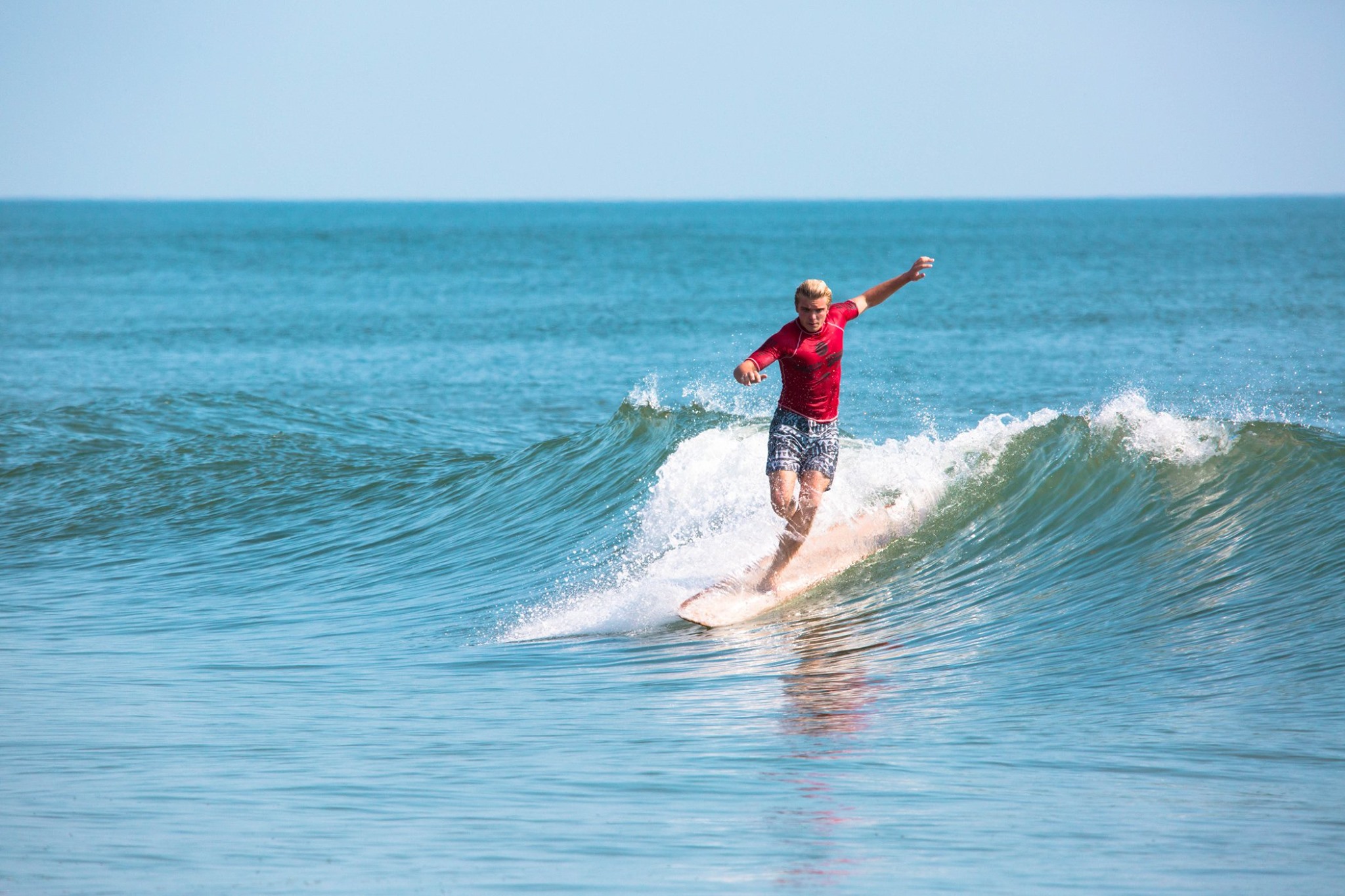 Visit Virginia Beach surfer