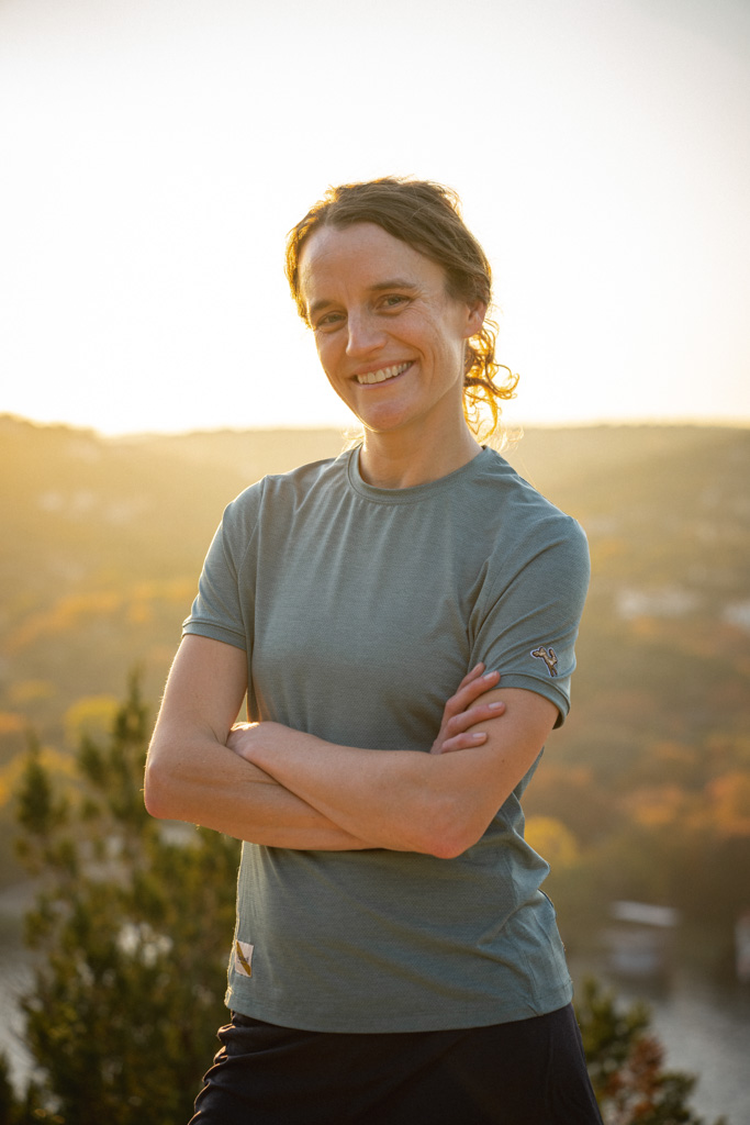 Tina Muir is a climate advocate, former elite marathoner, and founder of Racing for Sustainability, a nonprofit dedicated to driving environmental and social responsibility in the running industry. 