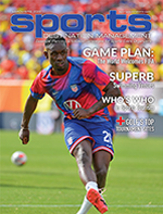 Cover of Sports Destination Management magazine showcasing a soccer player in action, highlighting athleticism and competitive spirit.