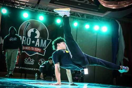 B-boy breakdancing in competition