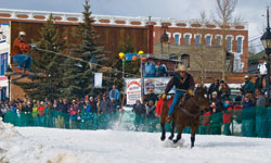 Main St, Leadville, Colorado. The Leadville Crystal Winter Carnival Race March, 2010. Ski joring began in Leadville in the early 1950s. Photo courtesy of Brooke Smith.