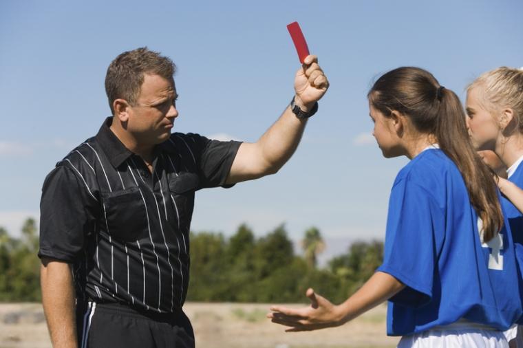 Protesting referee call in a soccer game