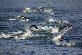 Triathlon swimming in a race