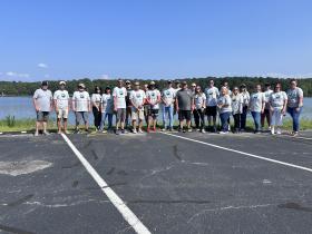 o anglers, MLF staff and workers from the Louisville (N.Y.) Recreation & Maintenance Department worked together in the rain at the Massena Intake Boat Launch in Massena to help clean the surrounding park and boat launch area.