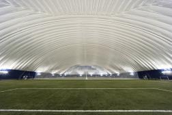 Under Domes and in Former Colleges, Sports Facility Development Innovations