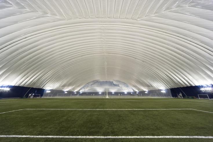 Under Domes and in Former Colleges, Sports Facility Development Innovations