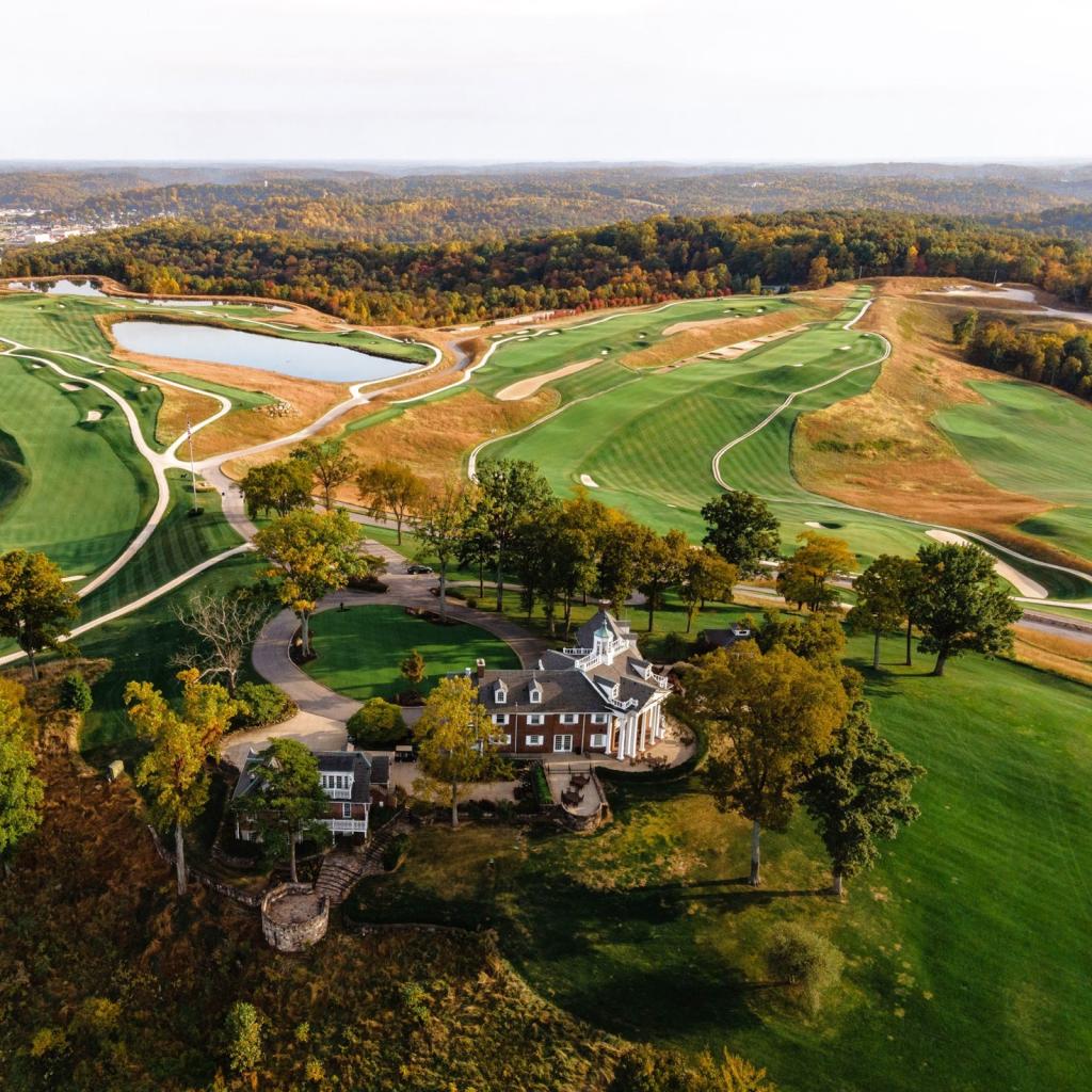 Luxury Golf Resort with Golfer Trying Skills in the Foreground
