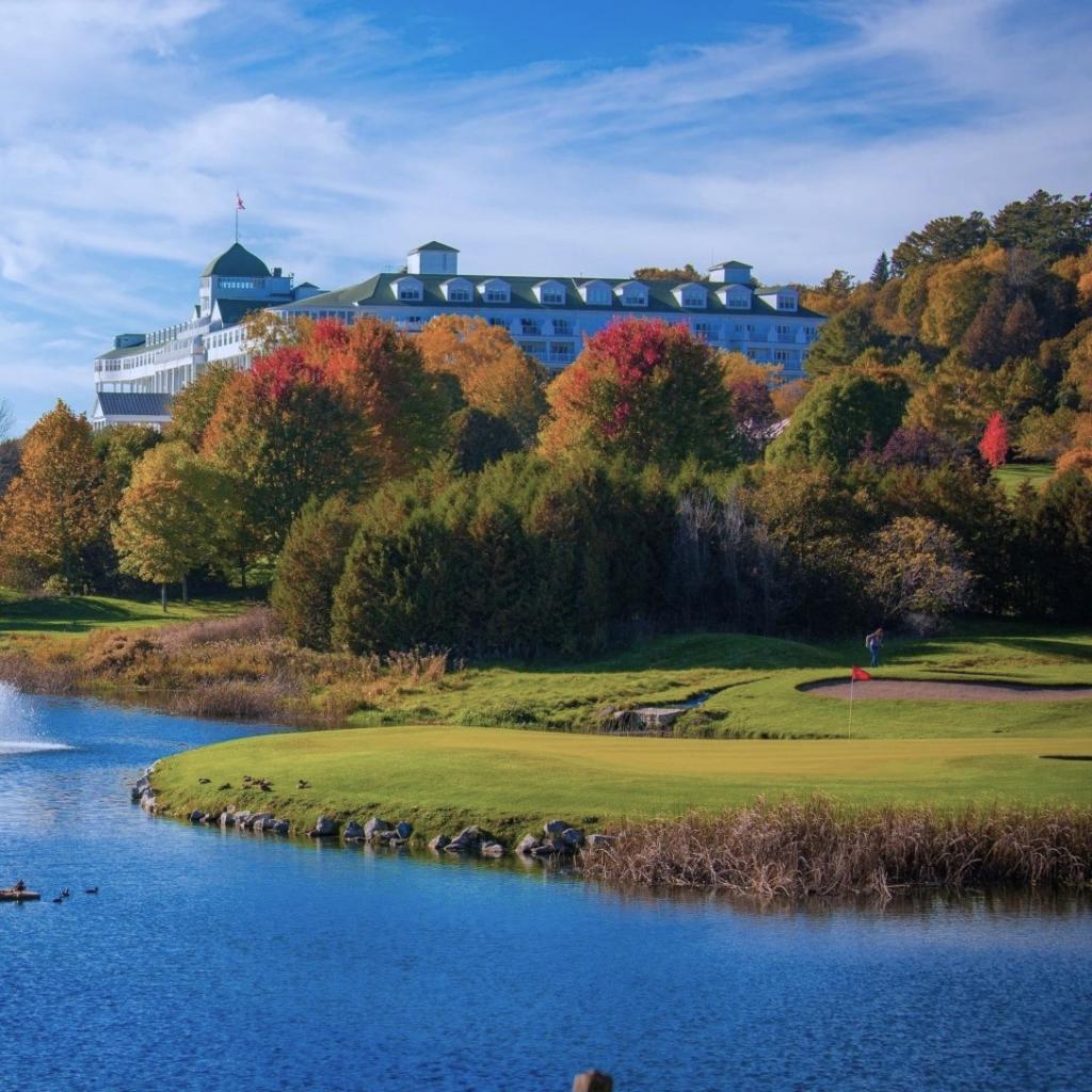 Luxury Golf Resort with Golfer Trying Skills in the Foreground