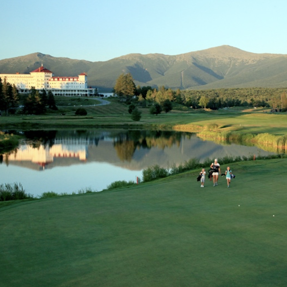 Luxury Golf Resort with Golfer Trying Skills in the Foreground