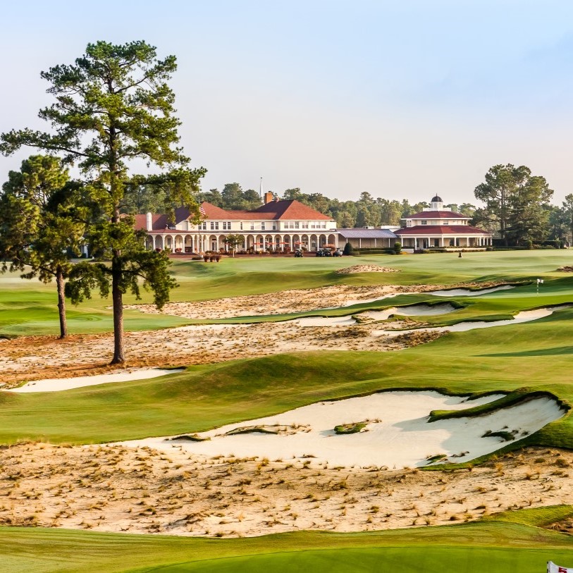 Luxury Golf Resort with Golfer Trying Skills in the Foreground